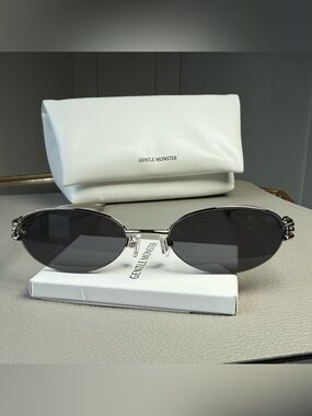 GENTLE MONSTER Oval Silver Frame Sunglasses with Black Lenses